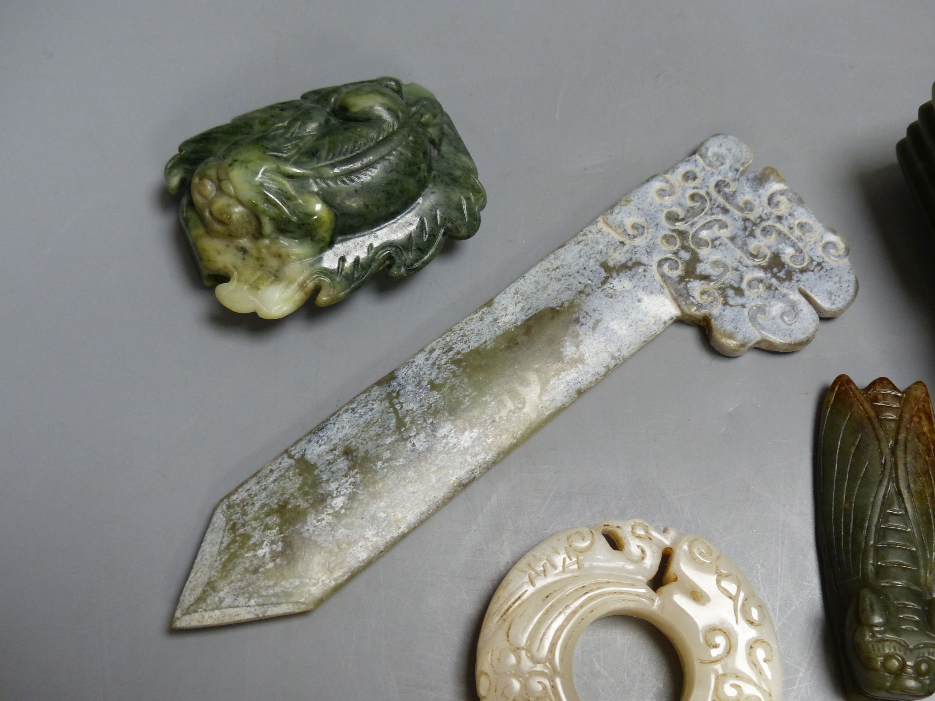 Seven Chinese jade or hardstone carvings, largest 15.5 cm